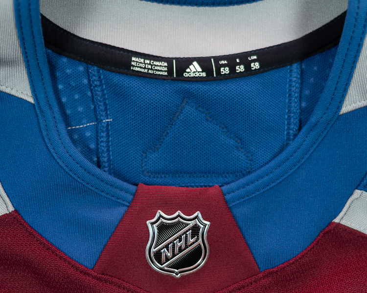Ryan Graves collar tagging Ryan Graves game worn jersey collar tagging